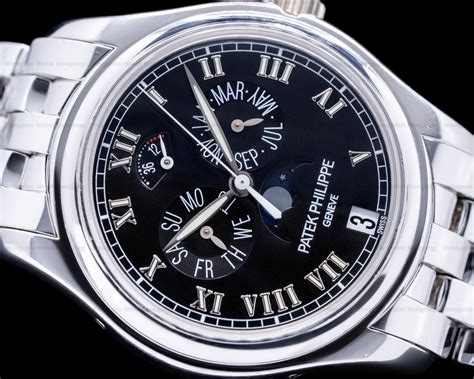 SIGNED PATEK PHILIPPE, GENEVE, REF. 5036/1G